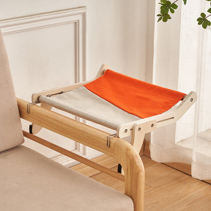 Happy cat lounging in sturdy hanging cat bed showing real-world use and comfort