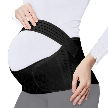 Maternity belly band worn over baby bump for back and pelvic support while pregnant