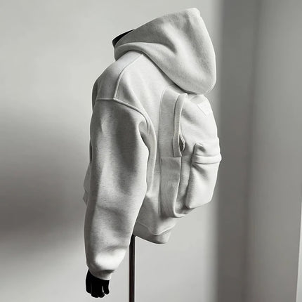 Hoodie with Integrated Backpack side profile displaying backpack compartment