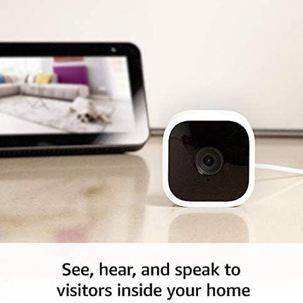 Blink Mini - Compact indoor plug-in smart security camera, 1080p HD video, night vision, motion detection, two-way audio, easy set up, Works with Alexa – 1 camera (White)