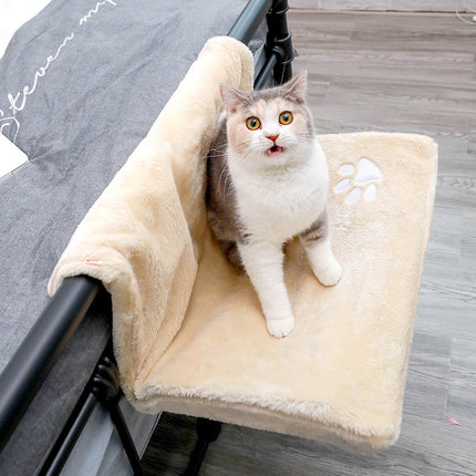 Wall-mounted cat hanging bed with happy cat resting inside perch