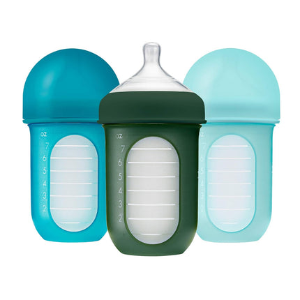 Boon Nursh Bottles - Silicone Baby Bottles Help Ease Colic Symptoms - Formula and Breast Milk Only Touch Food-Grade Silicone - Medium Flow - 8 Oz - Blue