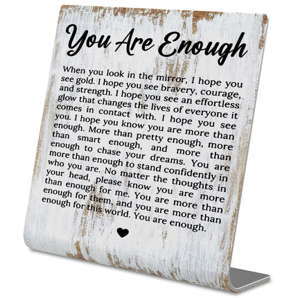 Letrero de escritorio inspiracional irrompible con cita de resiliencia y fuerza